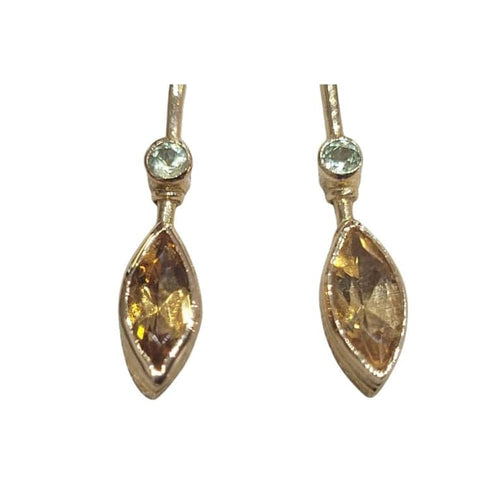 Boucles d'oreilles Boucles d’oreilles en or jaune 18 carats, citrines et péridots 58 Facettes PE780