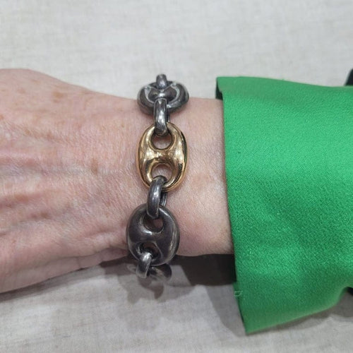 Bracelet Bracelet câble en argent et or jaune 18 carats 58 Facettes T444