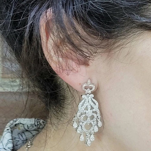 Boucles d'oreilles Boucles d'oreilles Art déco en or blanc 18 carats et diamants 58 Facettes PE501