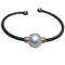 Bracelet Bracelet en acier brun avec perle australienne 58 Facettes PUV209