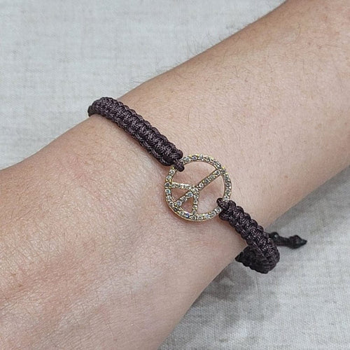 Bracelet Bracelet symbole de paix en macramé avec motif en or rose 18 carats et diamants 58 Facettes P174