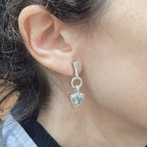 Boucles d'oreilles Boucles d'oreilles en or 18 carats avec aigues-marines et diamants 58 Facettes PE262