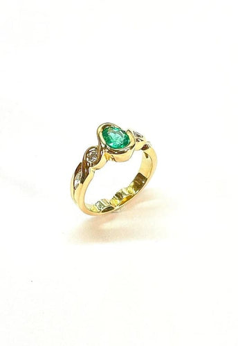 Bague 51 Bague en or jaune 18 carats avec émeraude ovale et diamants 58 Facettes