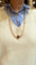 Collier Sautoir en perles baroques avec motif en or jaune 18 carats, saphir et grenats 58 Facettes