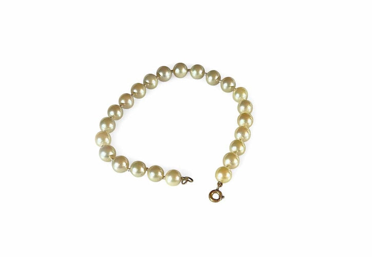 Bracelet Bracelet perles de culture blanches avec fermoir en or jaune 18 carats 58 Facettes