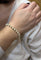 Bracelet Bracelet perles de culture blanches avec fermoir en or jaune 18 carats 58 Facettes