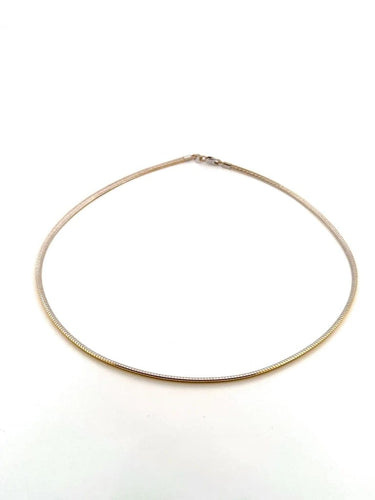 Collier Collier maille Oméga en or jaune et blanc 18 carats 58 Facettes