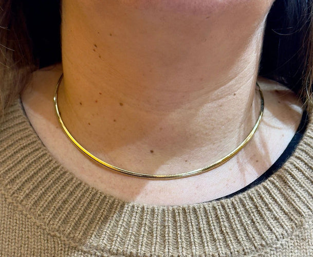 Collier Collier maille Oméga en or jaune et blanc 18 carats 58 Facettes
