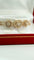 Bracelet Garrard Tudor Roses - Bracelet en or rose 18 carats et diamants 58 Facettes