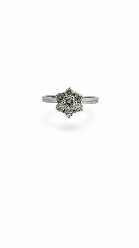 Bague 56 Bague marguerite en or blanc 18 carats et diamants 58 Facettes