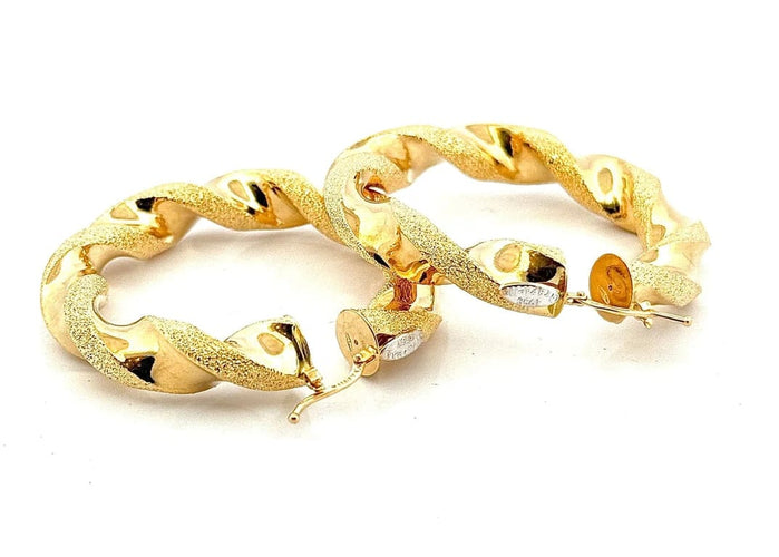 Boucles d'oreilles Graziella - Créoles torsadées en or jaune 18 carats 58 Facettes