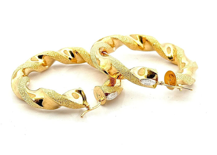 Boucles d'oreilles Graziella - Créoles torsadées en or jaune 18 carats 58 Facettes