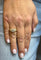 Bague 56 Bague ondulée en or jaune et diamants 58 Facettes