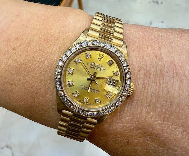 Montre Rolex Oyster Perpetual Datejust Lady - Montre en or jaune 18 ct et diamants 58 Facettes