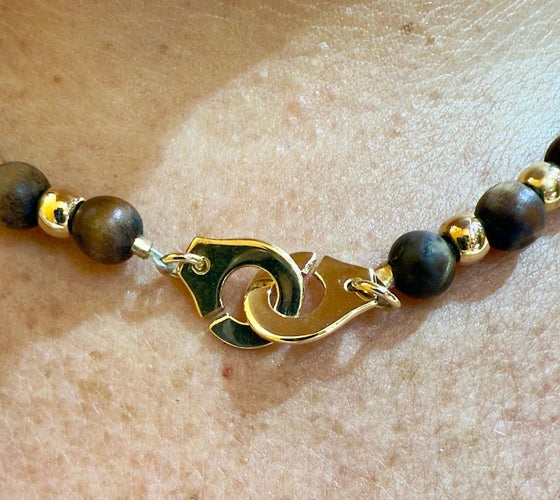 Collier Dinh Van - Collier en or jaune 18 carats et bois 58 Facettes