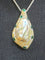 Collier Collier pendentif en or blanc 18 carats, mabé de Tahiti, émeraudes et diamants 58 Facettes