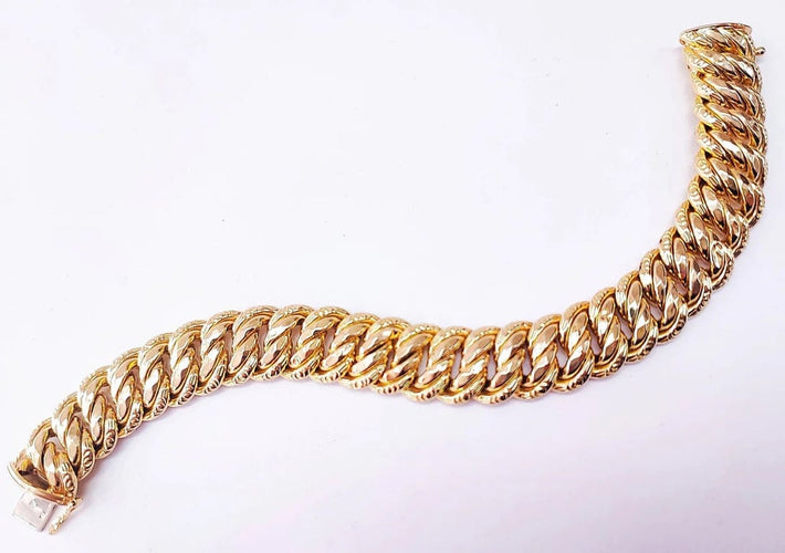 Bracelet Bracelet maille américaine en or jaune 18K 58 Facettes Bra.US.1505