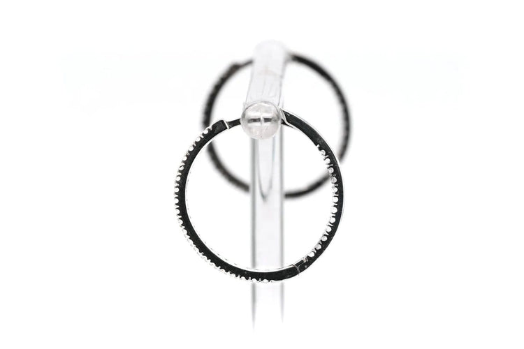 Boucles d'oreilles Créoles contemporaines en or blanc 18 carats et diamants 0,64 ct 58 Facettes 23087