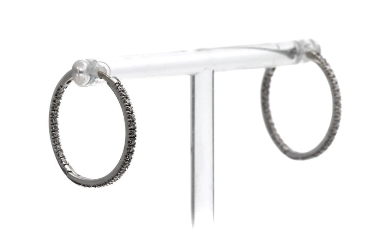 Boucles d'oreilles Créoles contemporaines en or blanc 18 carats et diamants 0,64 ct 58 Facettes 23087