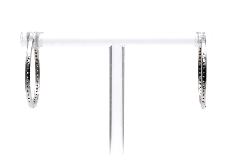 Boucles d'oreilles Créoles contemporaines en or blanc 18 carats et diamants 0,64 ct 58 Facettes 23087