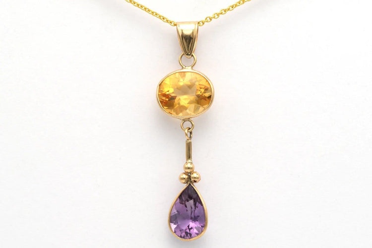 Pendentif Pendentif contemporain en or jaune 14 carats, améthyste et citrine 58 Facettes 23048