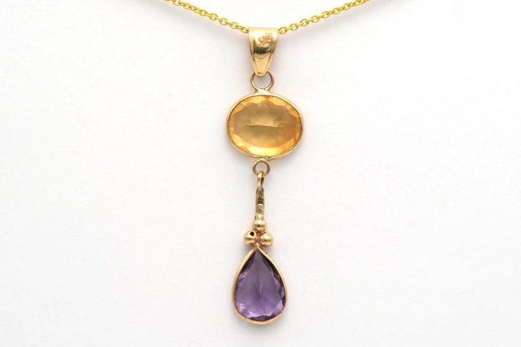 Pendentif Pendentif contemporain en or jaune 14 carats, améthyste et citrine 58 Facettes 23048