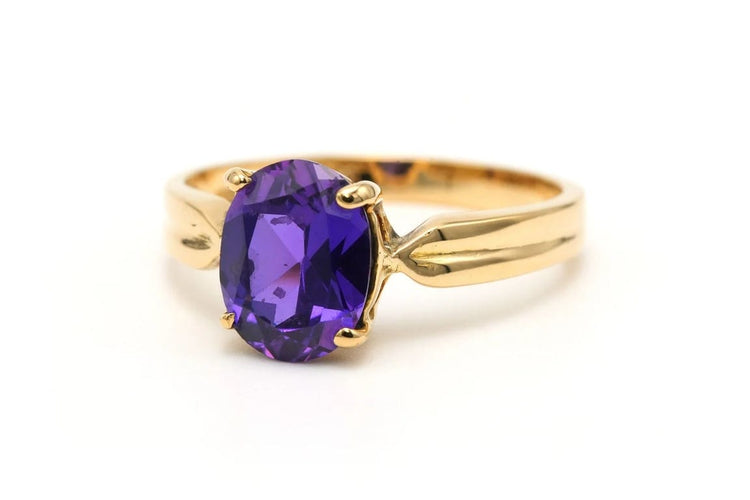 Bague 54 Bague contemporaine sertie d’une améthyste en or jaune 18 carats 58 Facettes 23125