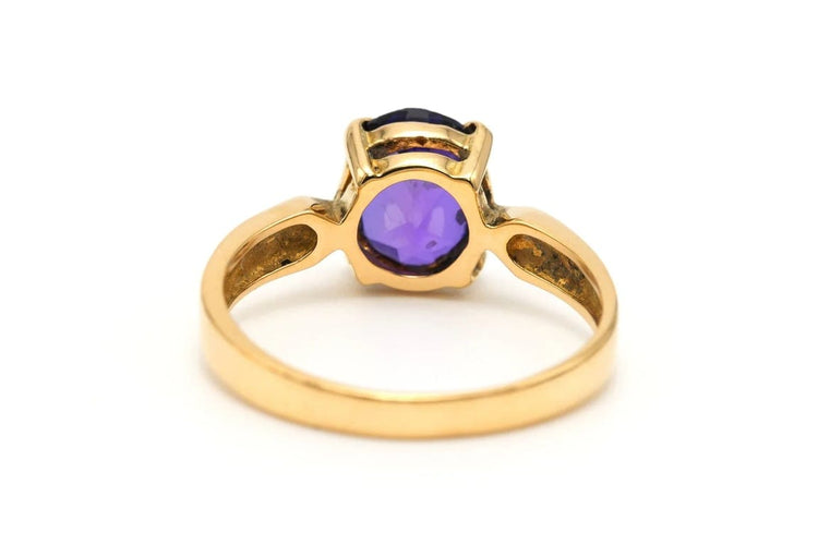 Bague 54 Bague contemporaine sertie d’une améthyste en or jaune 18 carats 58 Facettes 23125