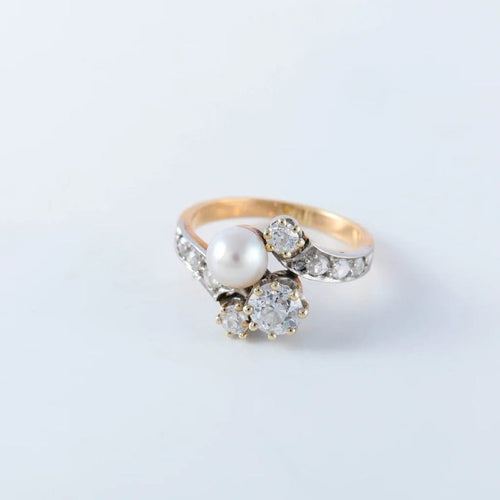 Bague 56 Bague toi et moi en or jaune et platine, perle fine et diamants 58 Facettes