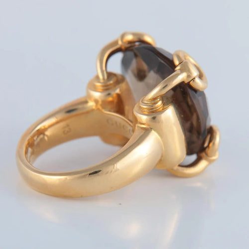 Bague 53 Gucci - Bague en or jaune 750 ornée d’un quartz fumé 58 Facettes