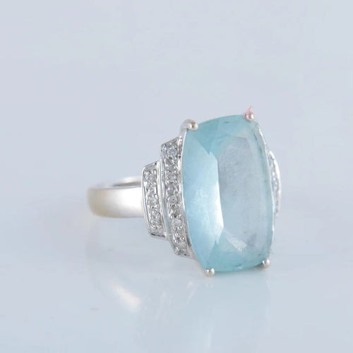 Bague 54 Bague en or blanc 18K avec aigue-marine et diamants 58 Facettes