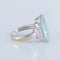 Bague 54 Bague en or blanc 18K avec aigue-marine et diamants 58 Facettes