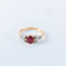 Bague 52 Bague en or jaune 18 ct avec rubis et diamants 58 Facettes
