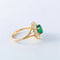 Bague 53 Bague en or jaune 18 ct avec émeraude et diamants 58 Facettes