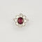 Bague 52 Bague marguerite en platine et or blanc, rubis et diamants 58 Facettes