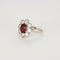 Bague 52 Bague marguerite en platine et or blanc, rubis et diamants 58 Facettes