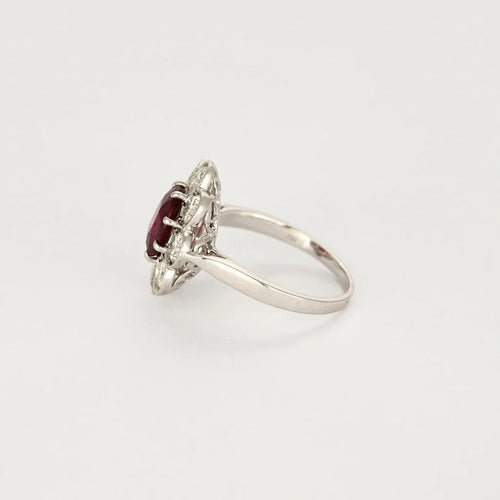 Bague 52 Bague marguerite en platine et or blanc, rubis et diamants 58 Facettes