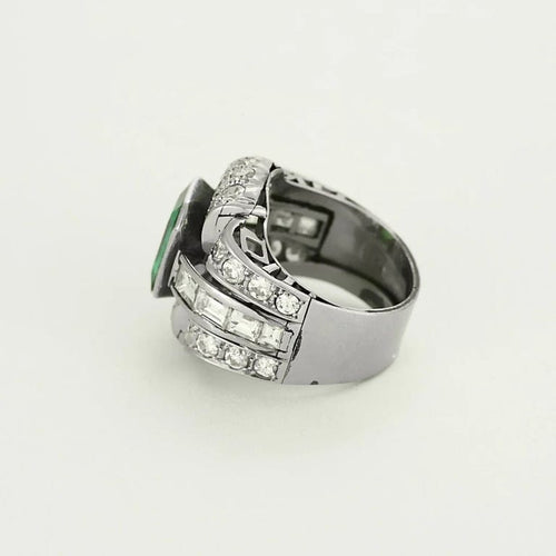 Bague 52 Bague Art déco en platine et or jaune, diamants et émeraude 58 Facettes