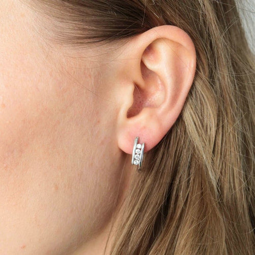 Boucles d'oreilles Boucles d'oreilles en or gris 18k et diamants taille brillant 0,40 ct 58 Facettes 395