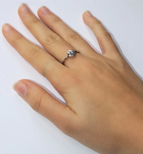 Bague 52 Bague solitaire en or blanc 18k avec diamant 0,52 ct 58 Facettes 412