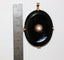 Pendentif Pendentif médaillon XIXe siècle en or jaune, onyx et perles 58 Facettes 468
