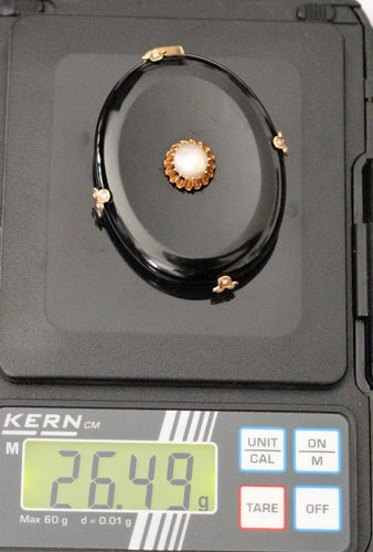 Pendentif Pendentif médaillon XIXe siècle en or jaune, onyx et perles 58 Facettes 468