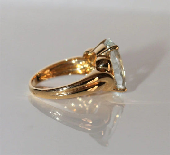 Bague 54 Bague en or jaune 18k sertie d’une aigue-marine ovale 4,93 ct 58 Facettes 515