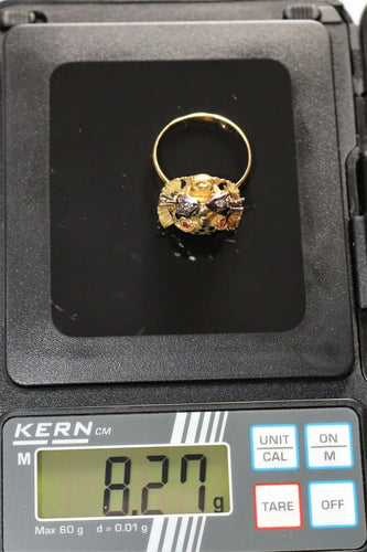 Bague 60 Bague panthère en or jaune 18 carats, émail, diamants et rubis 58 Facettes 329