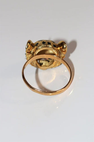 Bague 60 Bague panthère en or jaune 18 carats, émail, diamants et rubis 58 Facettes 329