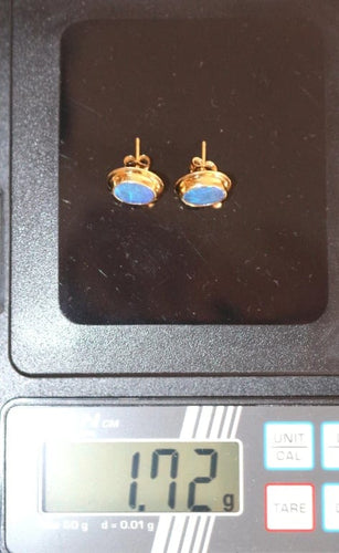 Boucles d'oreilles Puces d’oreilles en or jaune 14 carats et opales noires 58 Facettes 549