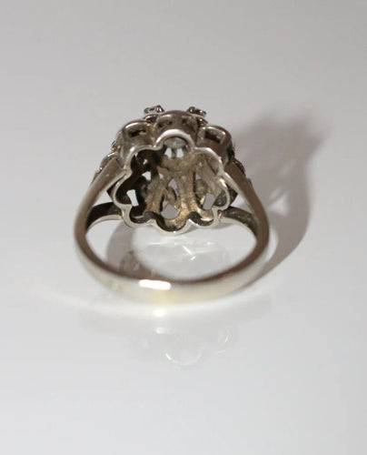 Bague 54 Bague marguerite en platine et or blanc, diamants 58 Facettes 567