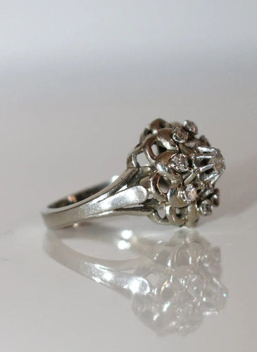 Bague 54 Bague marguerite en platine et or blanc, diamants 58 Facettes 567