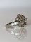 Bague 54 Bague marguerite en platine et or blanc, diamants 58 Facettes 567