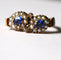 Bague 55 Bague duo ancienne en or jaune 18 carats, perles et pierres bleues 58 Facettes 573